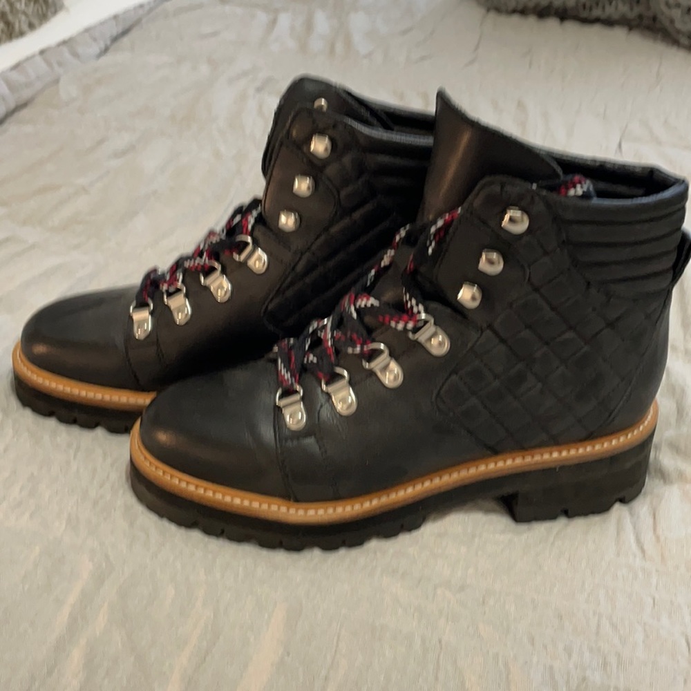Black hiking boots with quilted sides and textured bottoms. Women’s size 7
